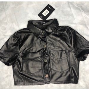 Leather button up crop top.